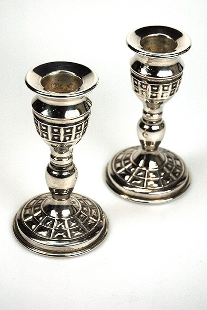 Old silver candlesticks